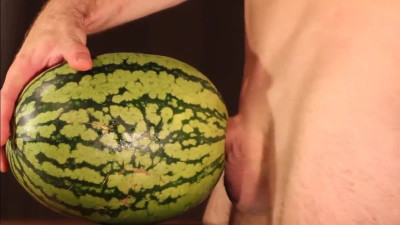 Muscular Stud Fucks and Cums on Watermelon